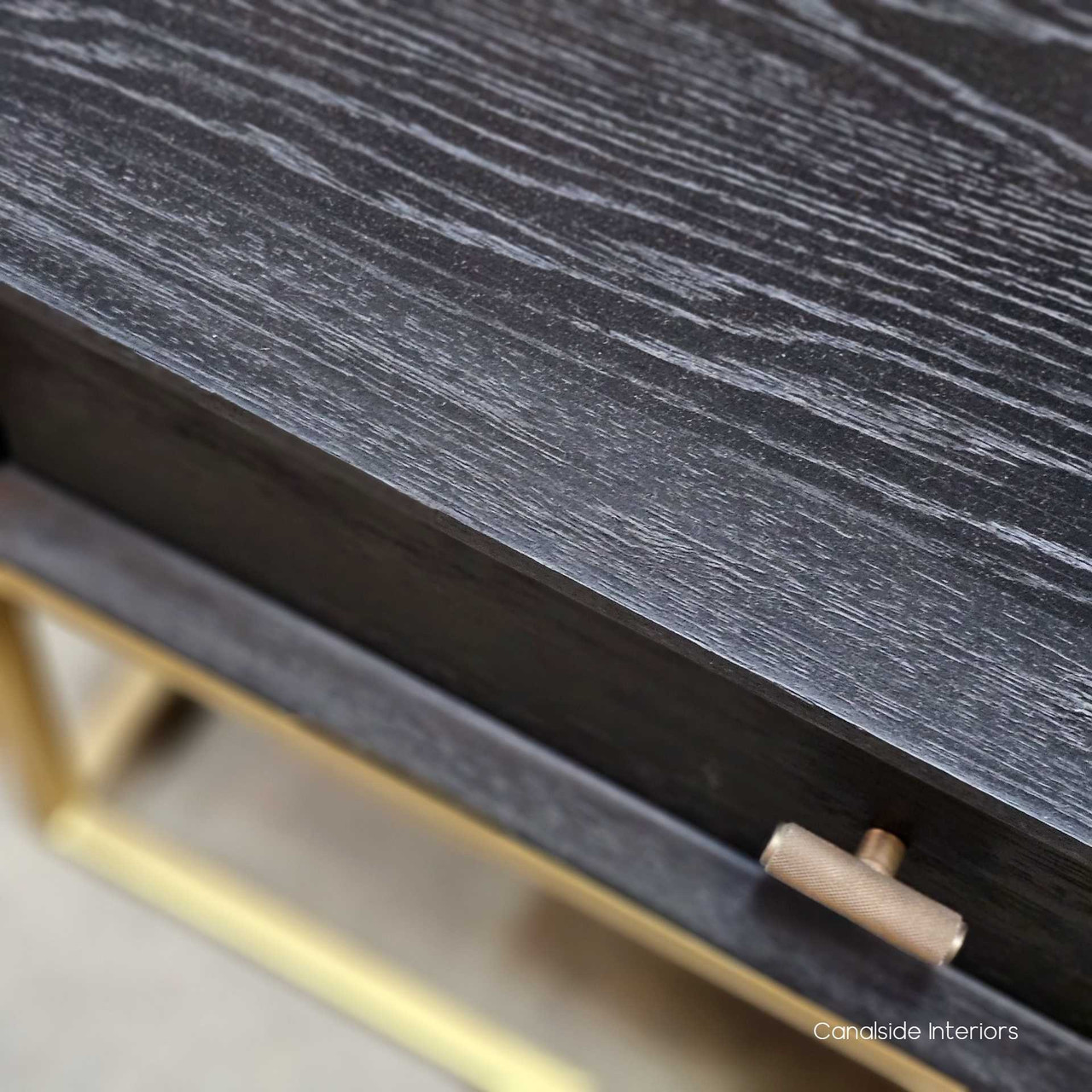 Close up detail  of the St Lucia Coffee Table showing the textured black finish
