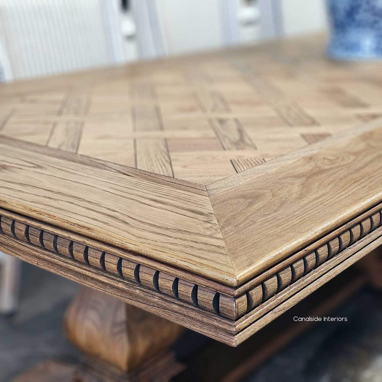 Close up Detail of the Berenson Table's exquisite craftsmanship, from its hand-laid parquetry to the carved apron
