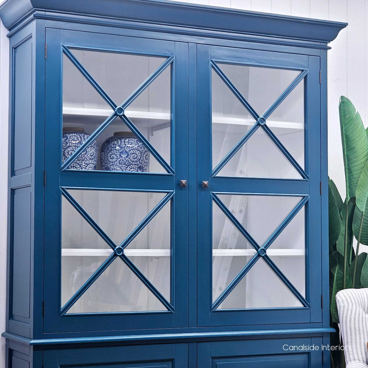 A side angle view of the South Hamptons Display Unit that emphasises the depth of the unit and the multiple shelving layers, illustrating the functional design and storage capacity.