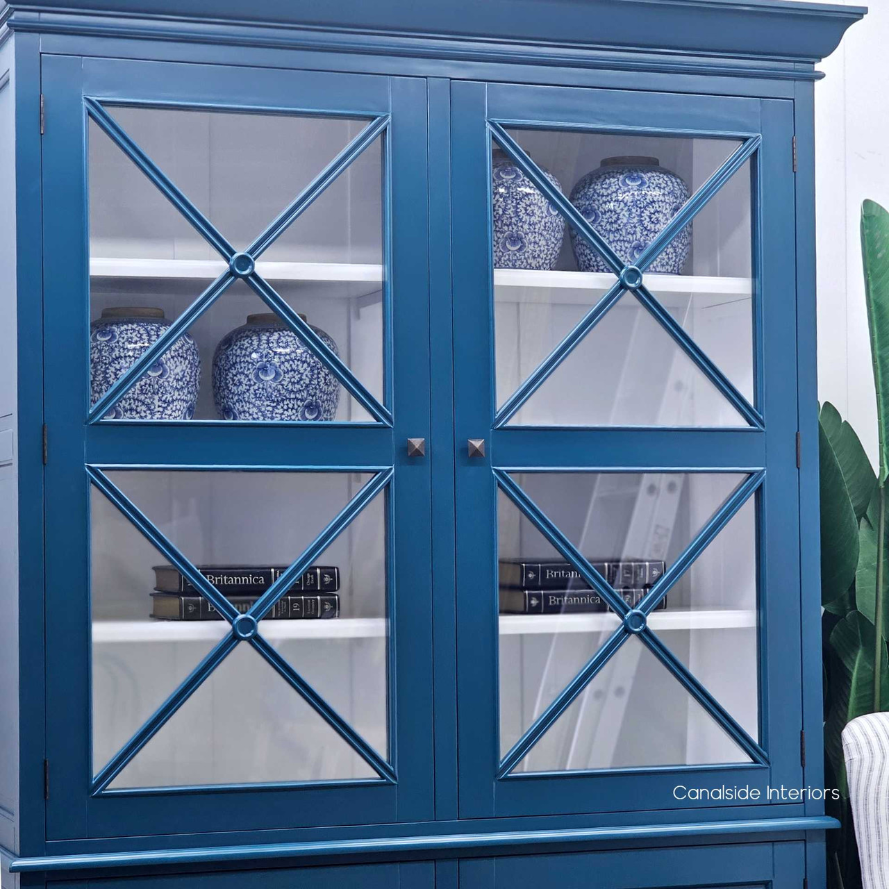 A diagonal angle that highlights the South Hamptons wall unit’s profile, showing off its depth and the play of light on the teal green finish.