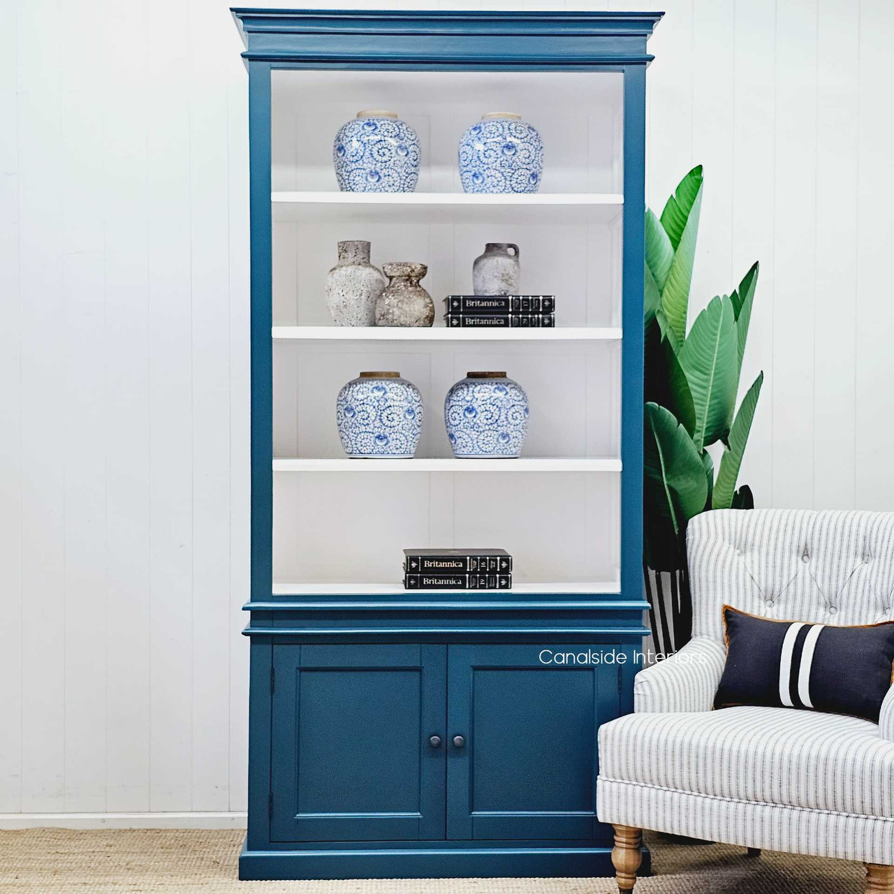 Frontal View of the Teal Green Grange Wall Unit - Showcasing the entire bookshelf/bookcase in a vibrant teal green, capturing its full height and width to highlight its presence in any room.