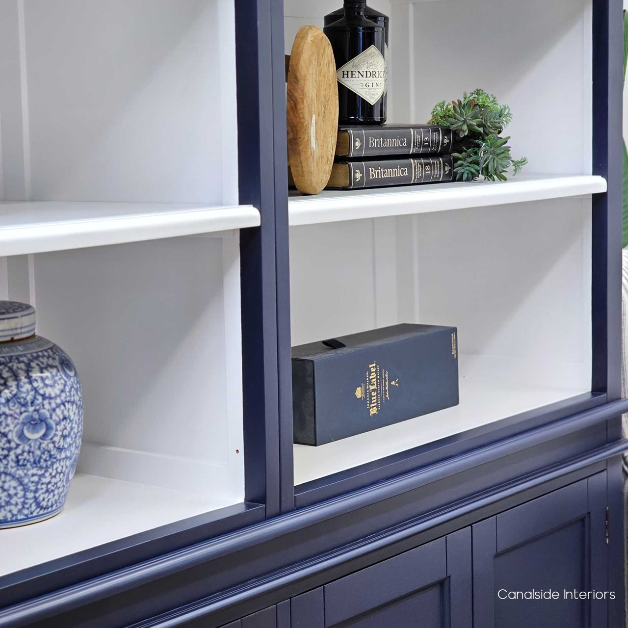 Close-up of the shelf edges, showcasing the fine detailing and quality craftsmanship of the Grange Wall Unit.