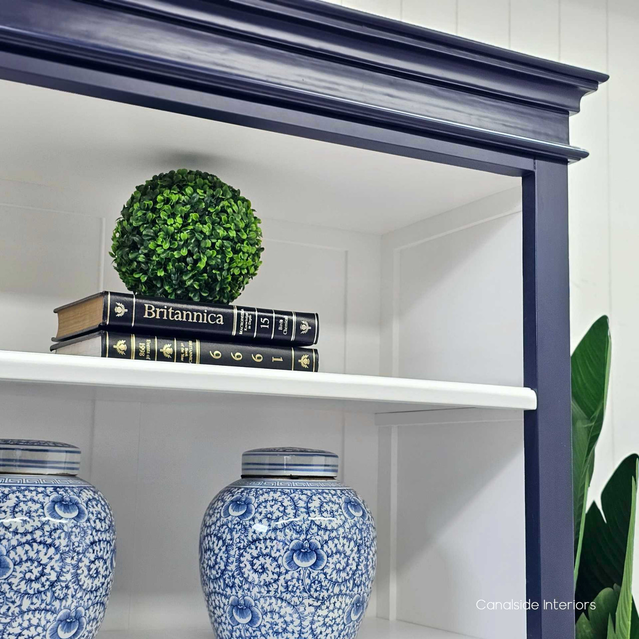 Detailed shot of the top moulding, showcasing the craftsmanship and classic design elements of the Grange Wall Unit.