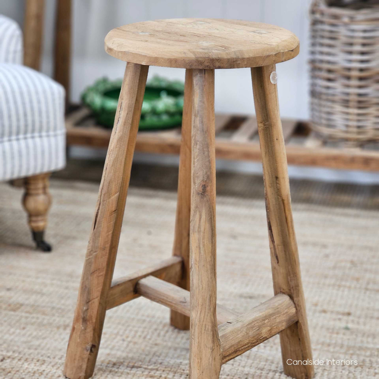 Angled front view of the Vintage Teak Kitchen Stool, emphasizing its classic proportions and durable craftsmanship.