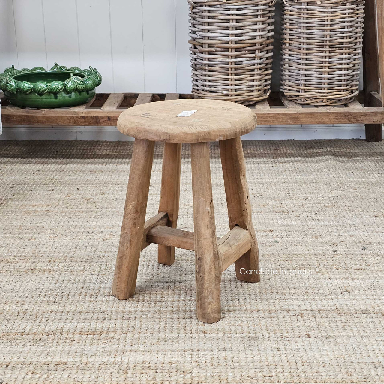 Back view of the Vintage Teak Round Stool, showing its seamless construction and elegant curves.