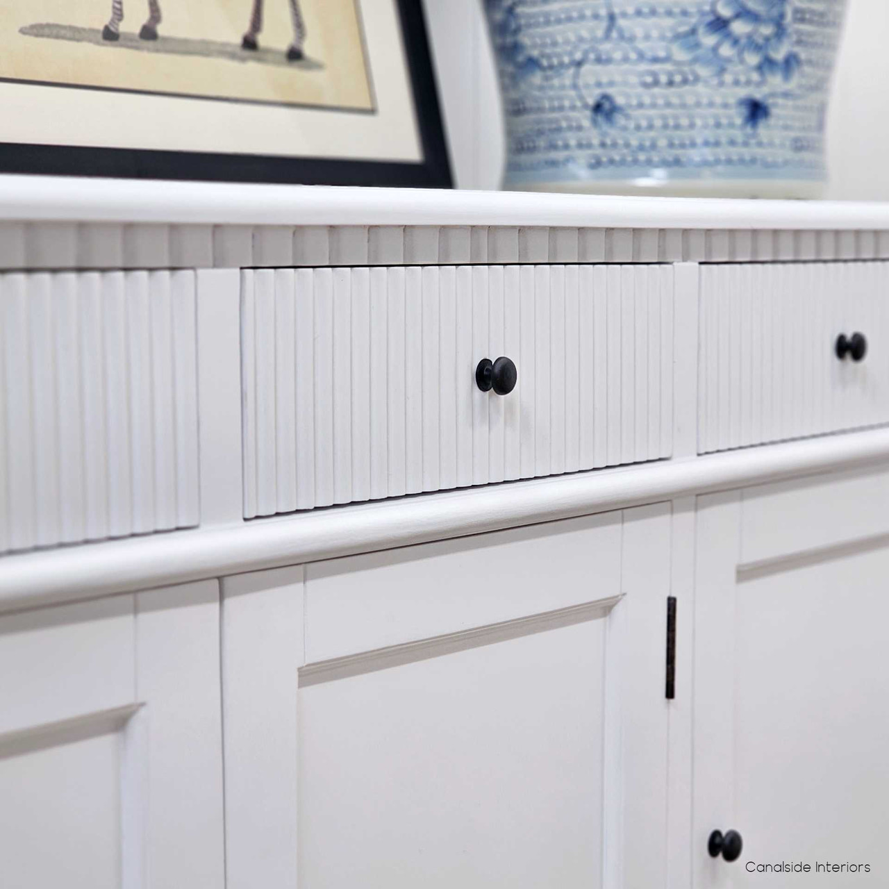 Close up angle of fluting ribbed detail on the drawers of the Louis Curved Sideboard