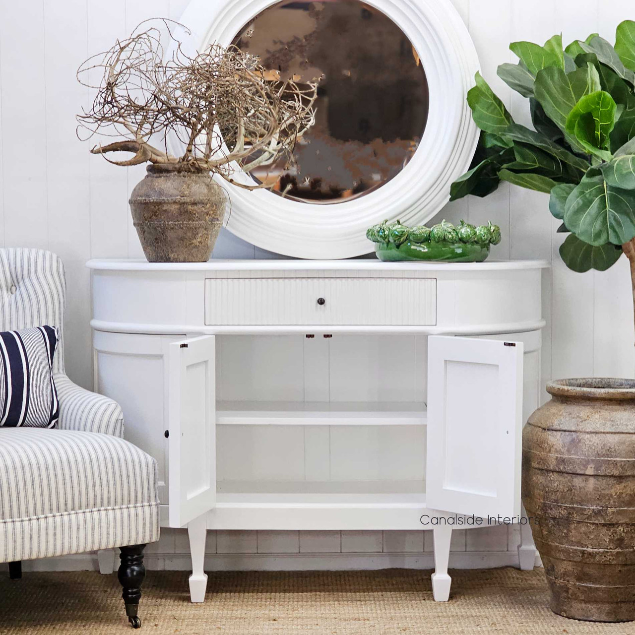 Front view of the Louis Curved Sideboard’s cabinet doors partially open, revealing the neatly designed shelving.