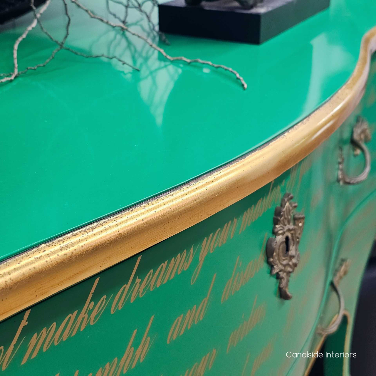 Close-up of the gold-trimmed edge along the top surface, capturing the craftsmanship and hand-finished appeal.