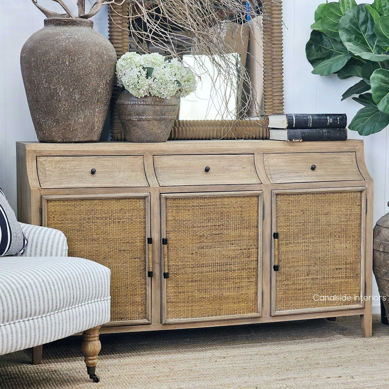 Angled view highlighting the interplay between wood grain and woven texture.