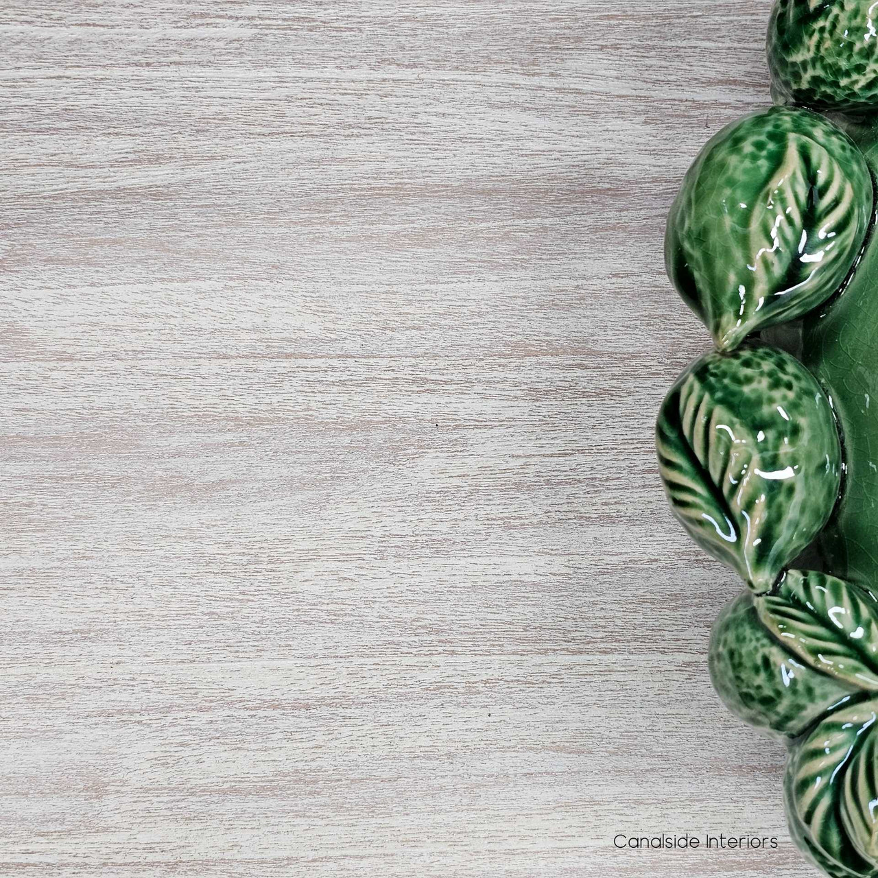 Close-up of the limewash top surface, showcasing its soft grain, natural texture, and hand-applied finish.