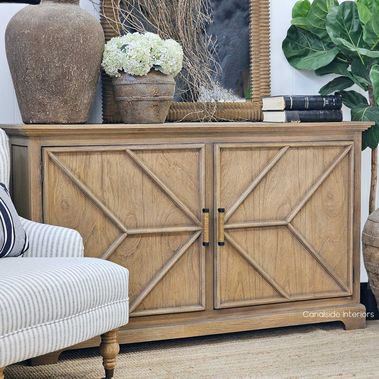 Soft light cast across the doors, enhancing the wood’s natural variation.