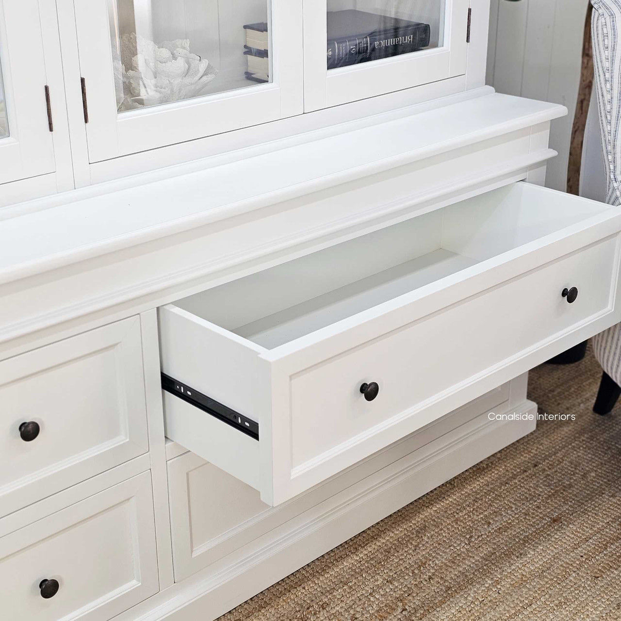 Drawers partially open to reveal internal space for practical storage.