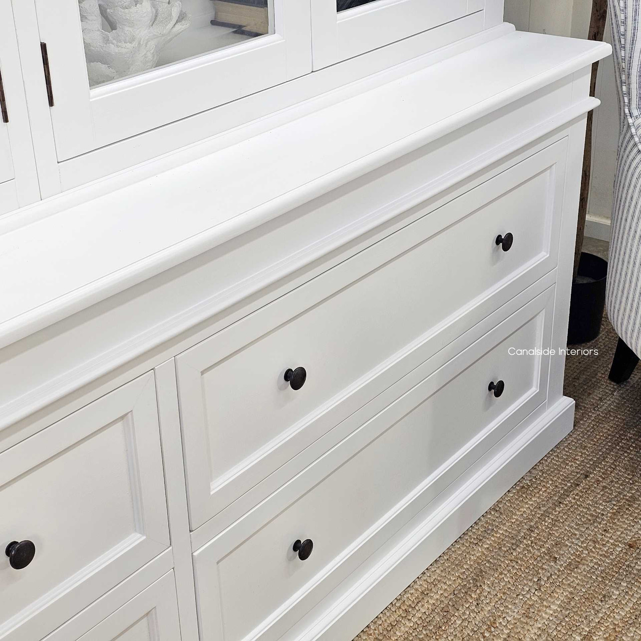 Lower section of the unit in focus with all drawers closed, highlighting symmetry and finish.