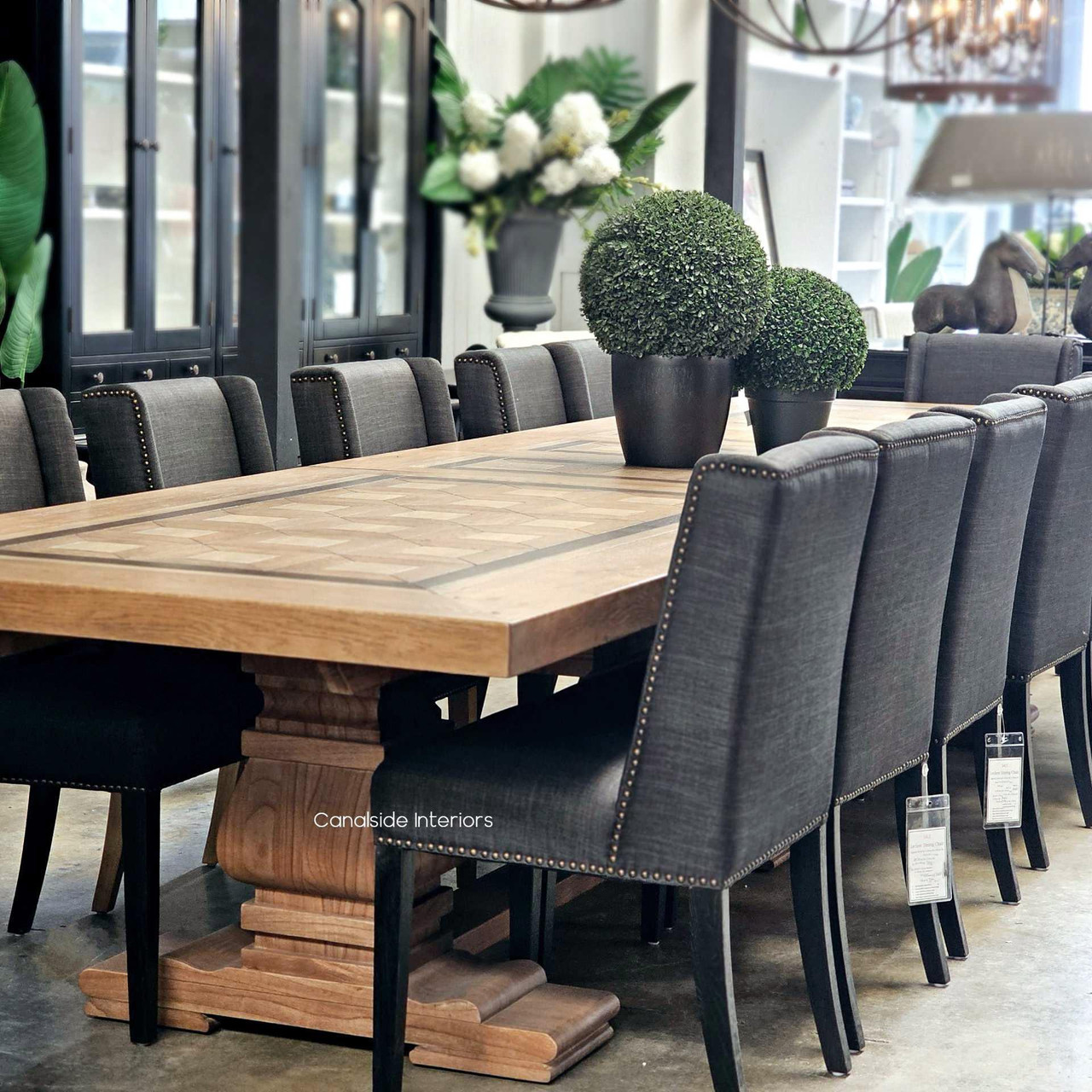 Side angle of the 3.5m Chambers extendable dining table styled in a classic Hamptons interior.