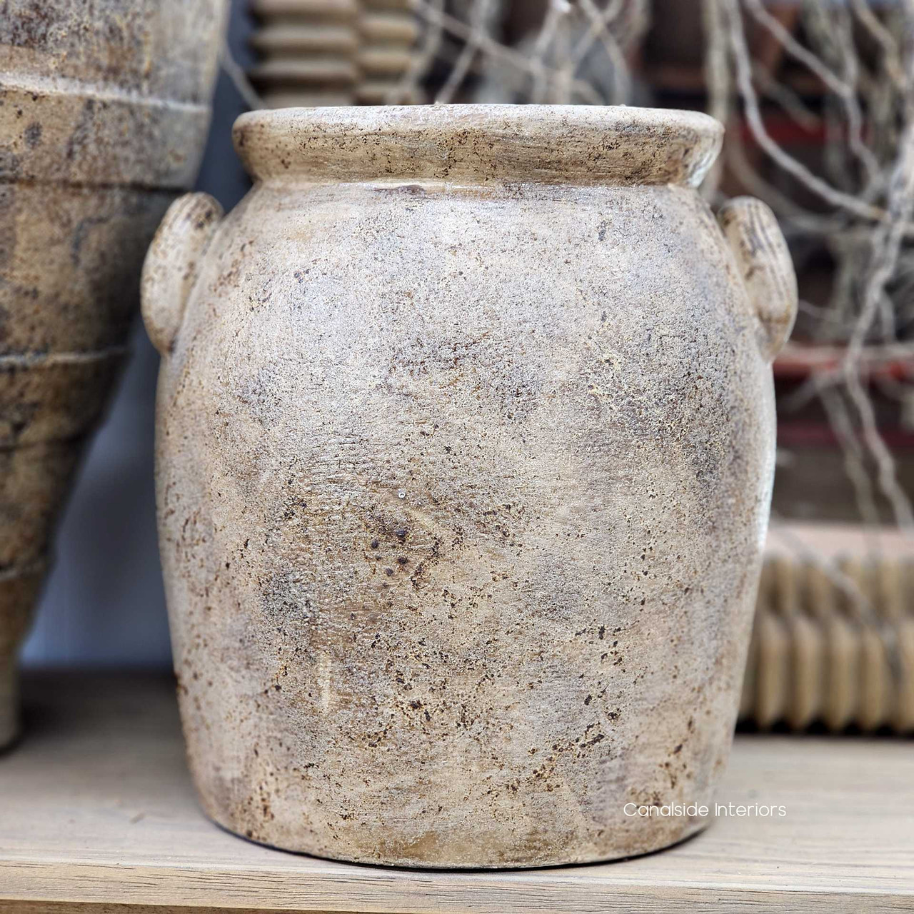 Natural light image of the Sekar pot, drawing out tonal warmth in the clay and highlighting its handcrafted character.