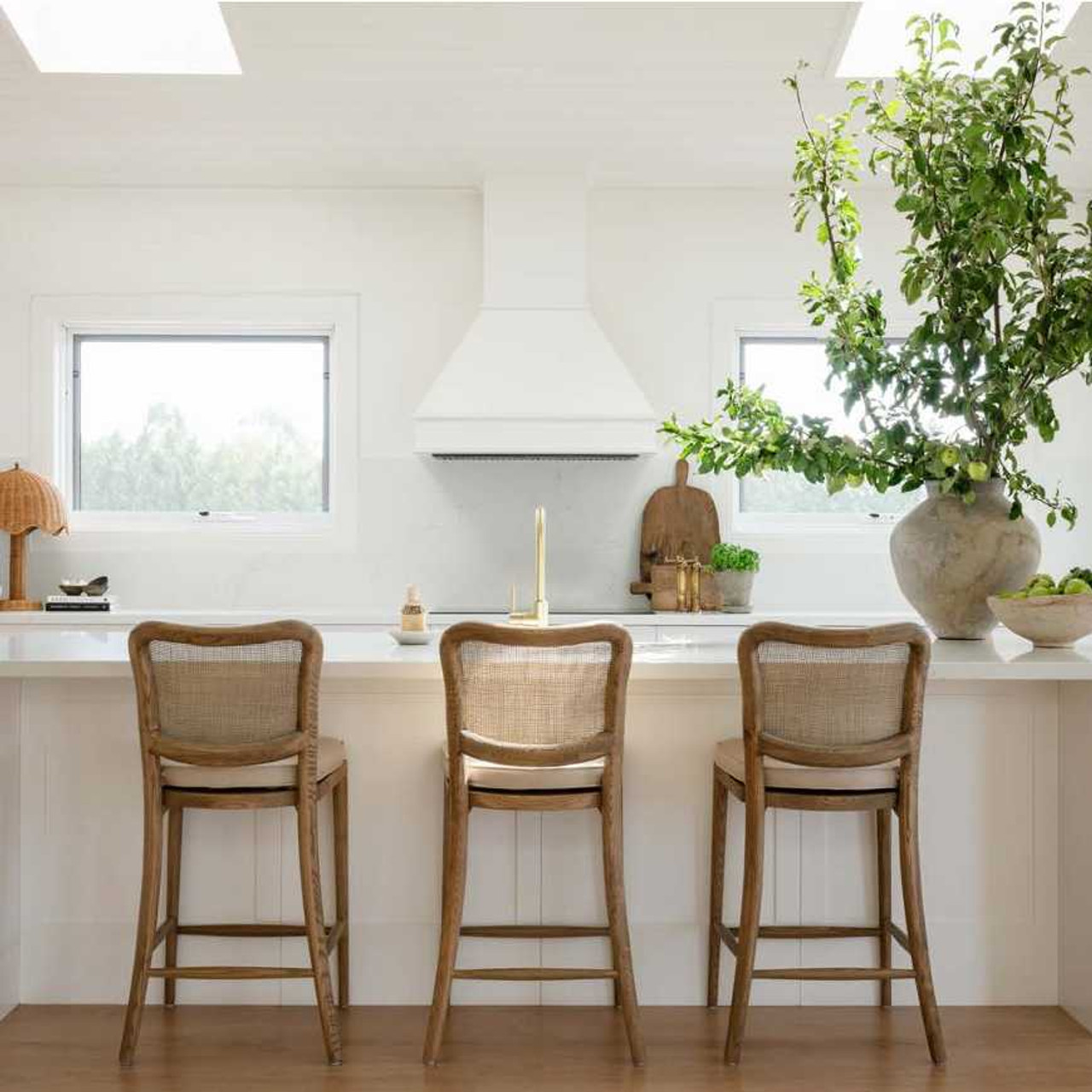 Editorial kitchen shot with Canalside's Noda bar stools front and centre.