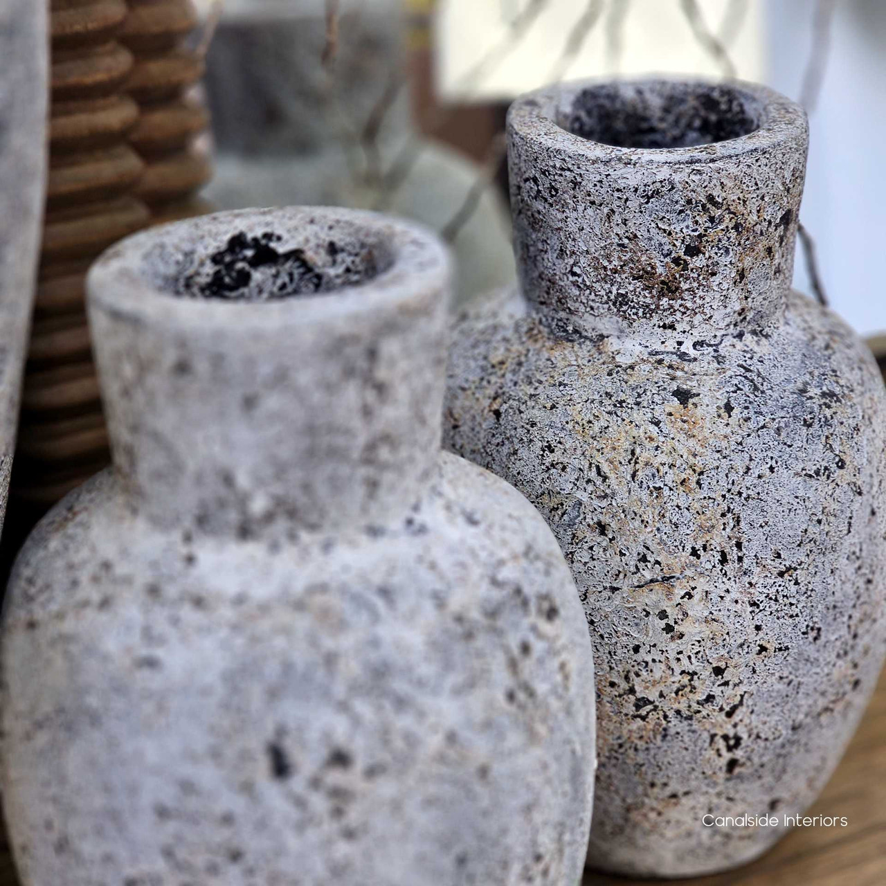 Close-up of the Kirana Vintage Vessel’s stonewash finish, revealing the handcrafted surface and earthy speckled texture in layered grey and ivory tones.