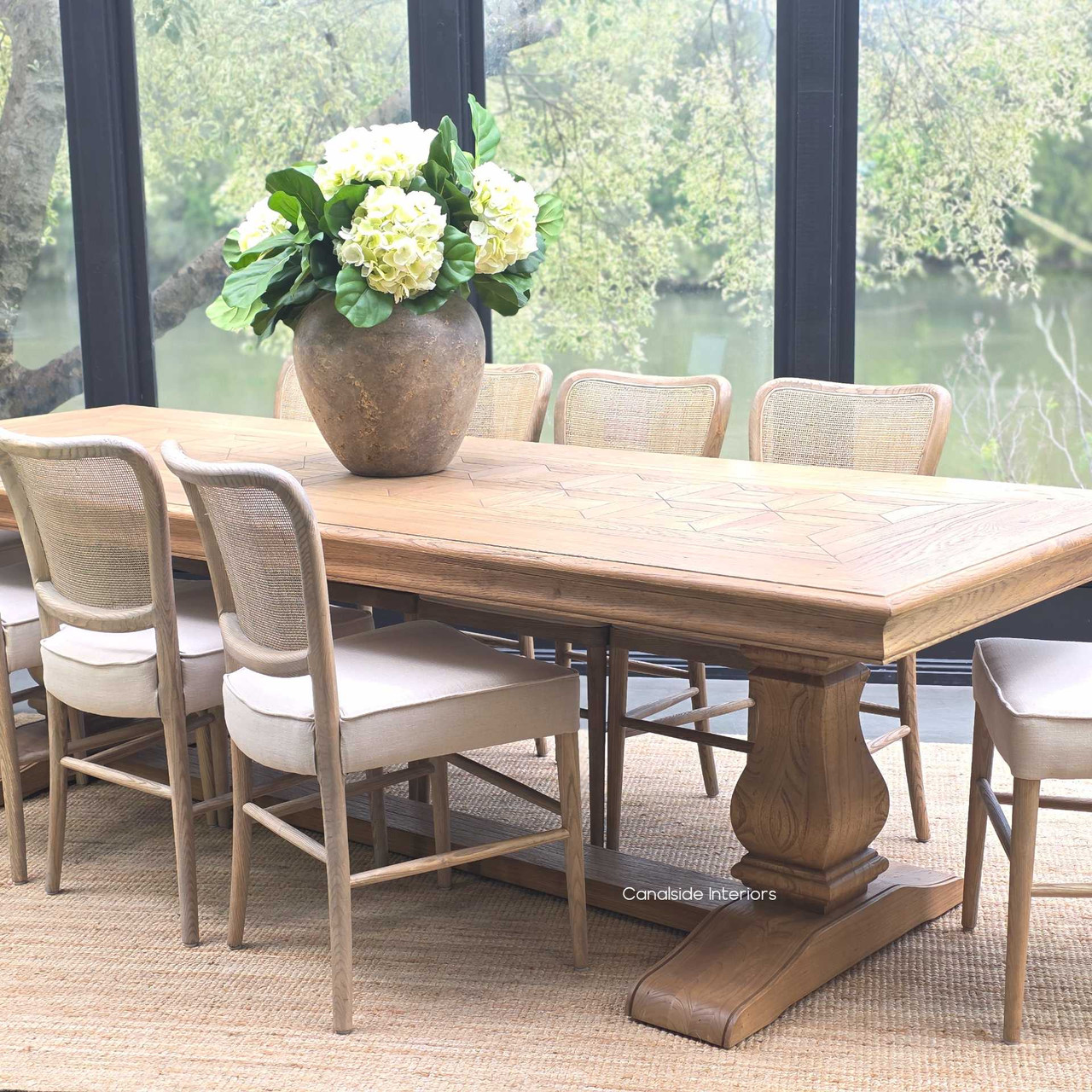 Angled view of the Chesterton table capturing the balance of classic design and modern elegance.