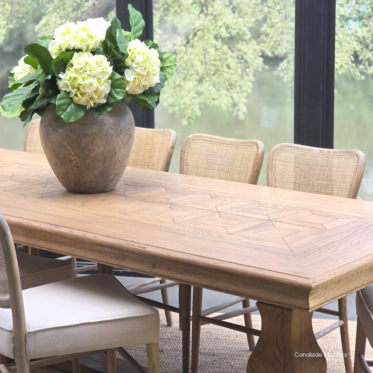 Angled lifestyle shot showing the Chesterton table styled for a modern farmhouse interior.