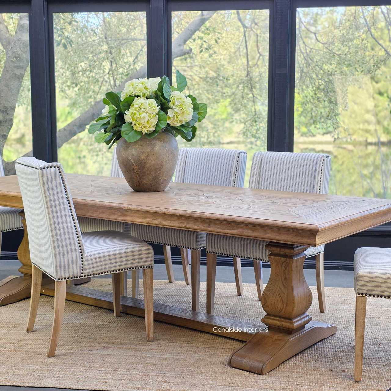 Room setting with the 280cm Chesterton as the focal point in an open-plan dining area.