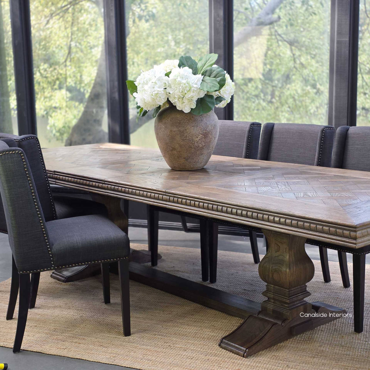Berenson Cigar oak double extension dining table fully extended for large gatherings.