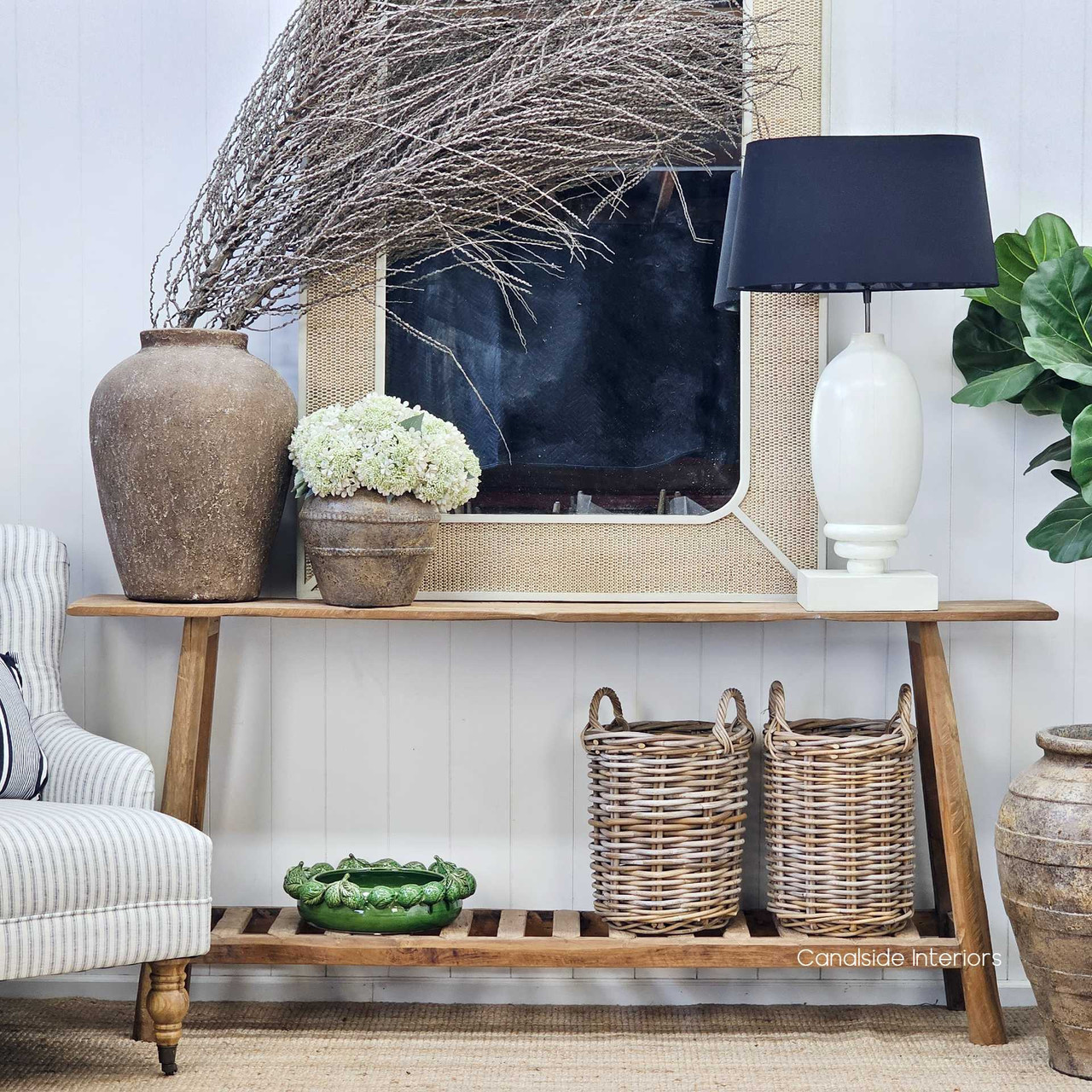 Minimalist setting featuring the Vintage Teak Console, complementing modern, rustic, and Hamptons-style interiors.