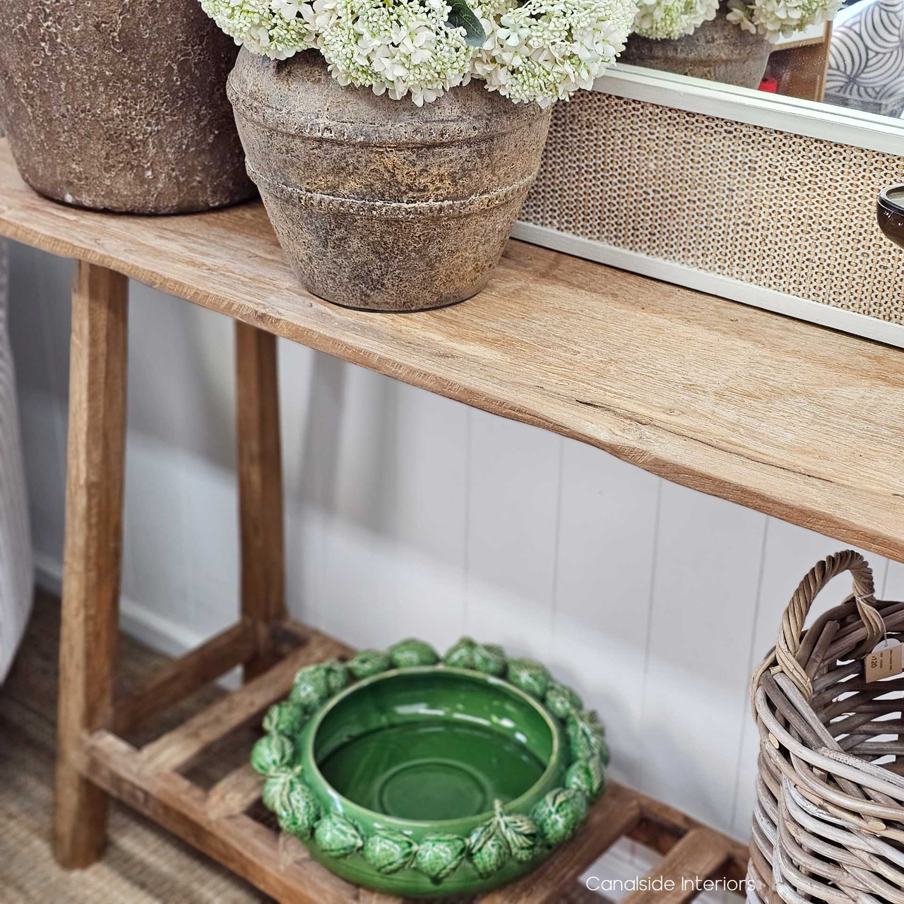 Close-up of the Vintage Teak Console’s surface, revealing the natural imperfections and character of aged teak.
