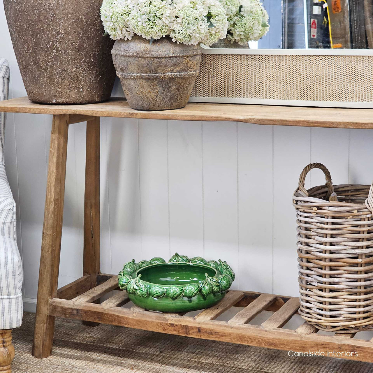Angled view of the Vintage Teak Console, displaying its rustic texture and streamlined design.