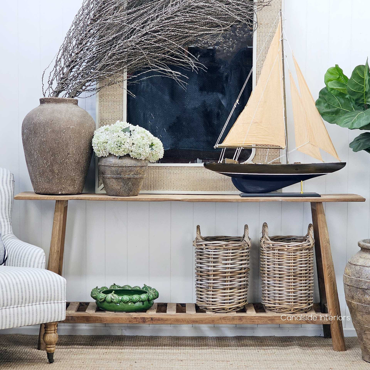 Front view of the Vintage Teak Console, showcasing its minimalist design and beautifully weathered teak wood.
