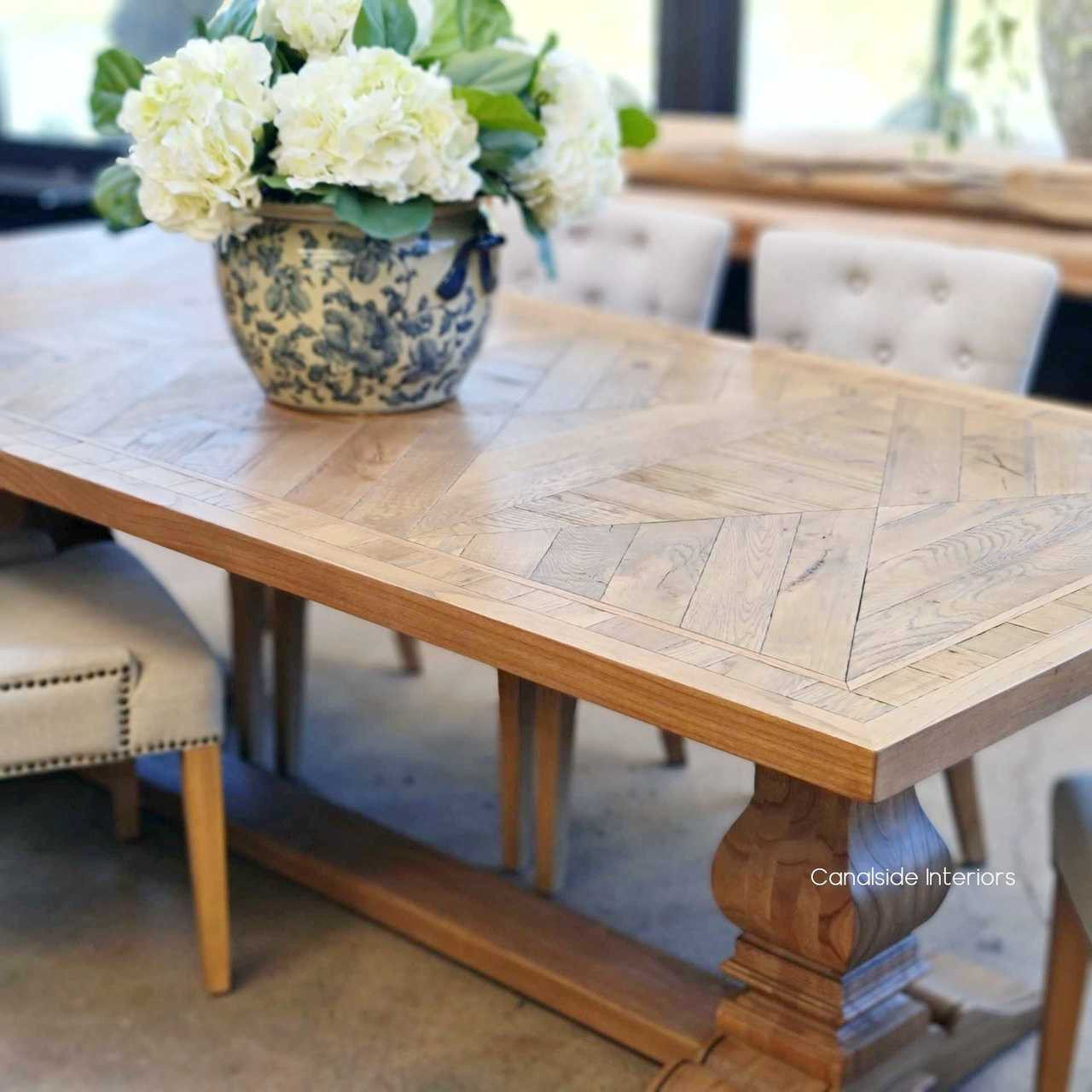 Crafted for longevity, the Danbury Parquetry Oak Table offers a refined dining solution for modern home decor - Canalside Interiors.
