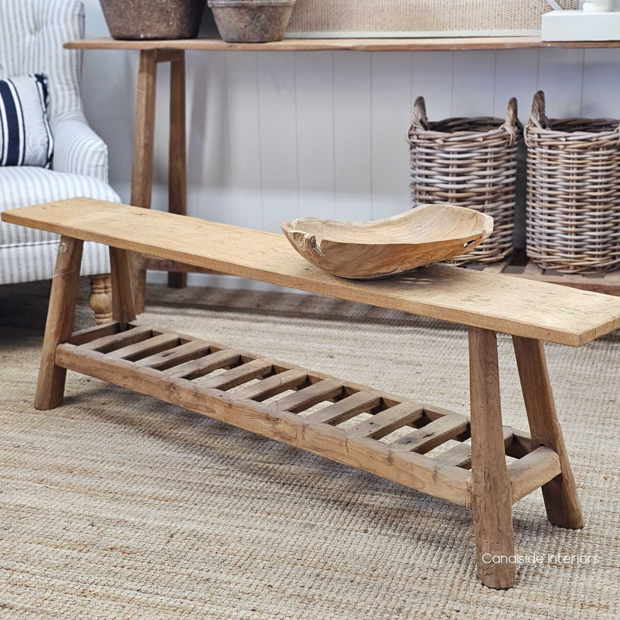 Detailed shot of the joinery on the Vintage Teak Bench, showcasing expert construction and the seamless integration of the slatted base.