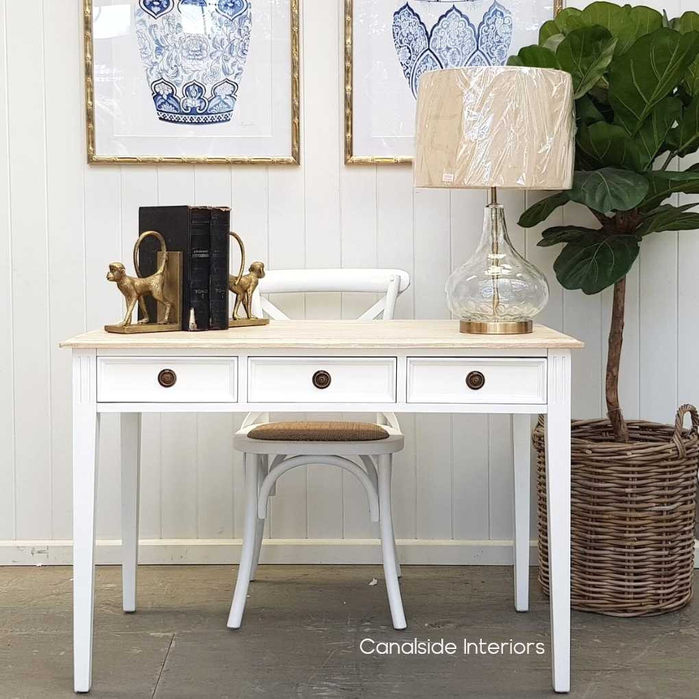 Front view of the Peninsula Desk/Console in white with a limewash top, showcasing its versatility and elegant design in a Hamptons-inspired setting.