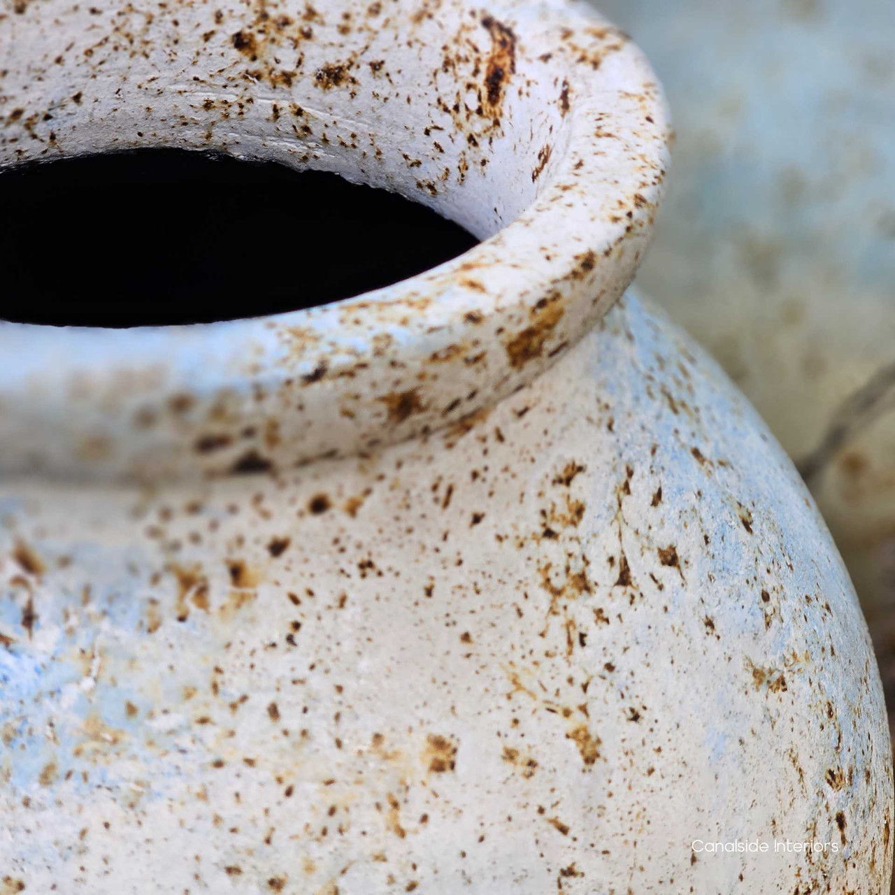 Close up of the surface showing the coastal stone inspired finish.