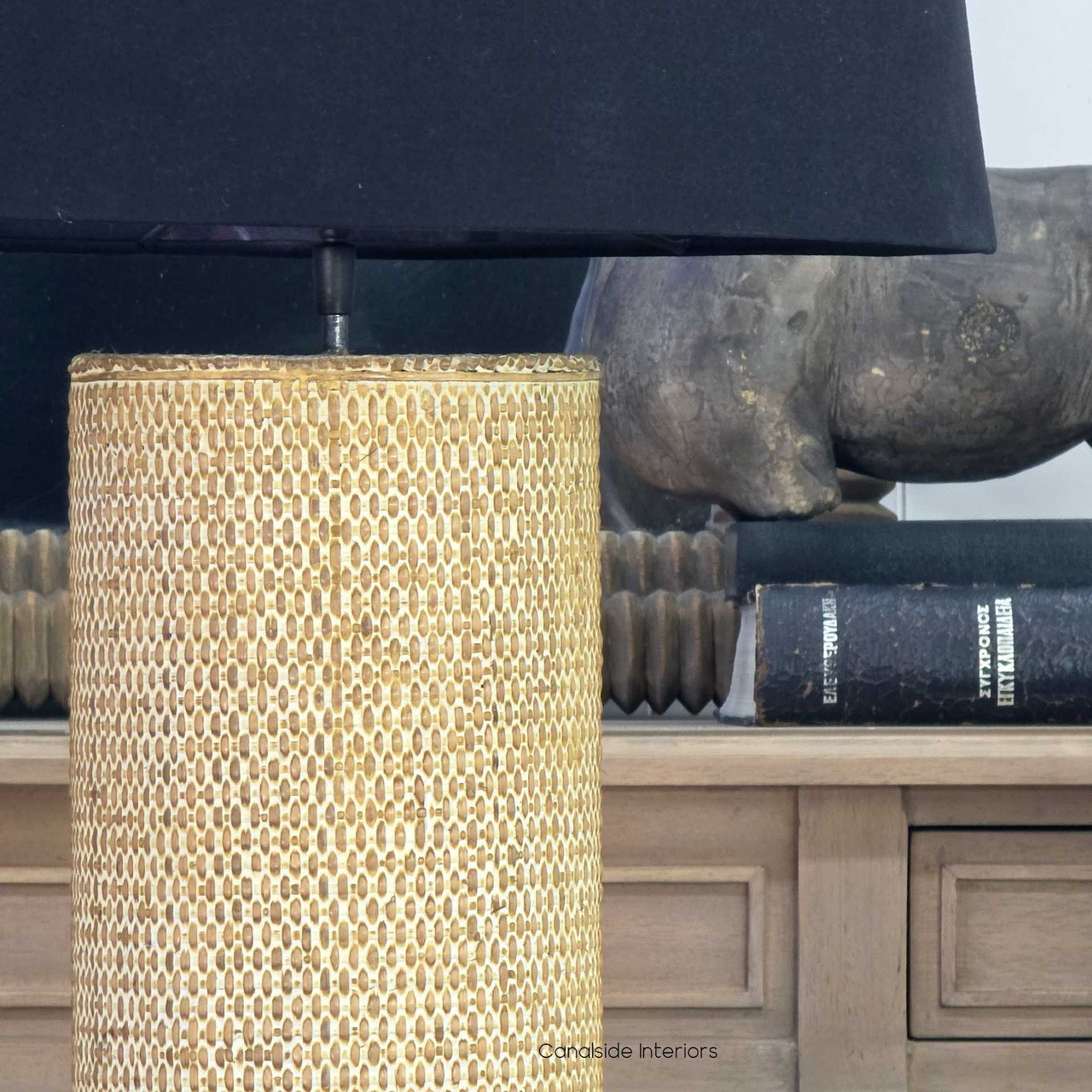 Brielle woven rattan lamp base close up with detailed natural texture