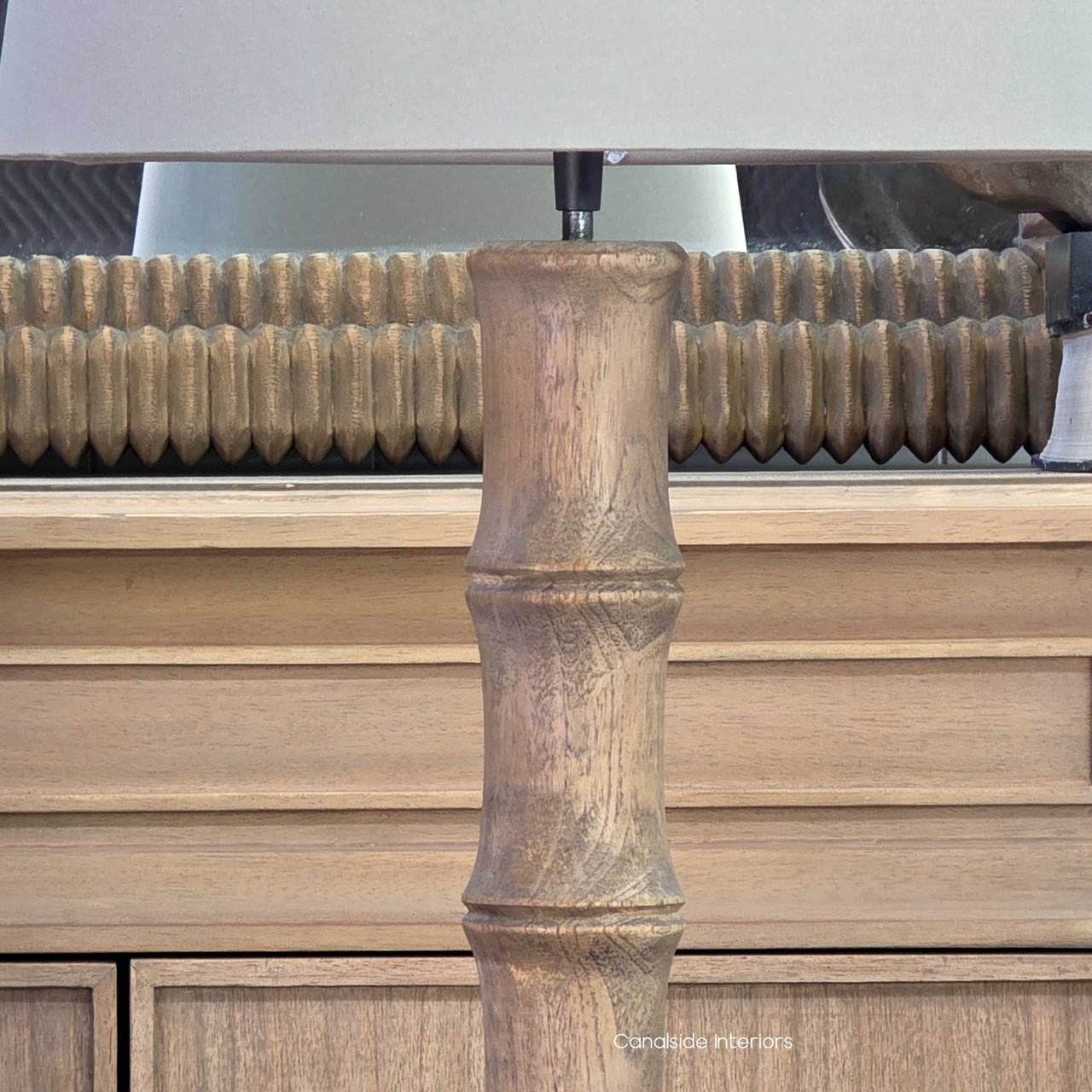 Close up of the Chippendale bamboo style lamp base in natural wood finish