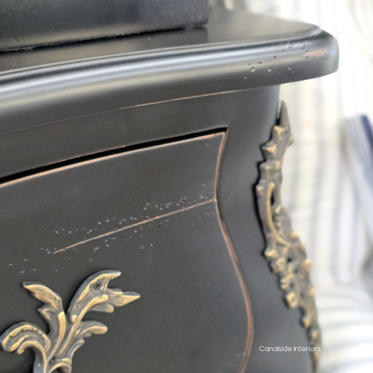 Close-up of drawer edges and gentle fade, showing subtle brushwork and vintage appeal.