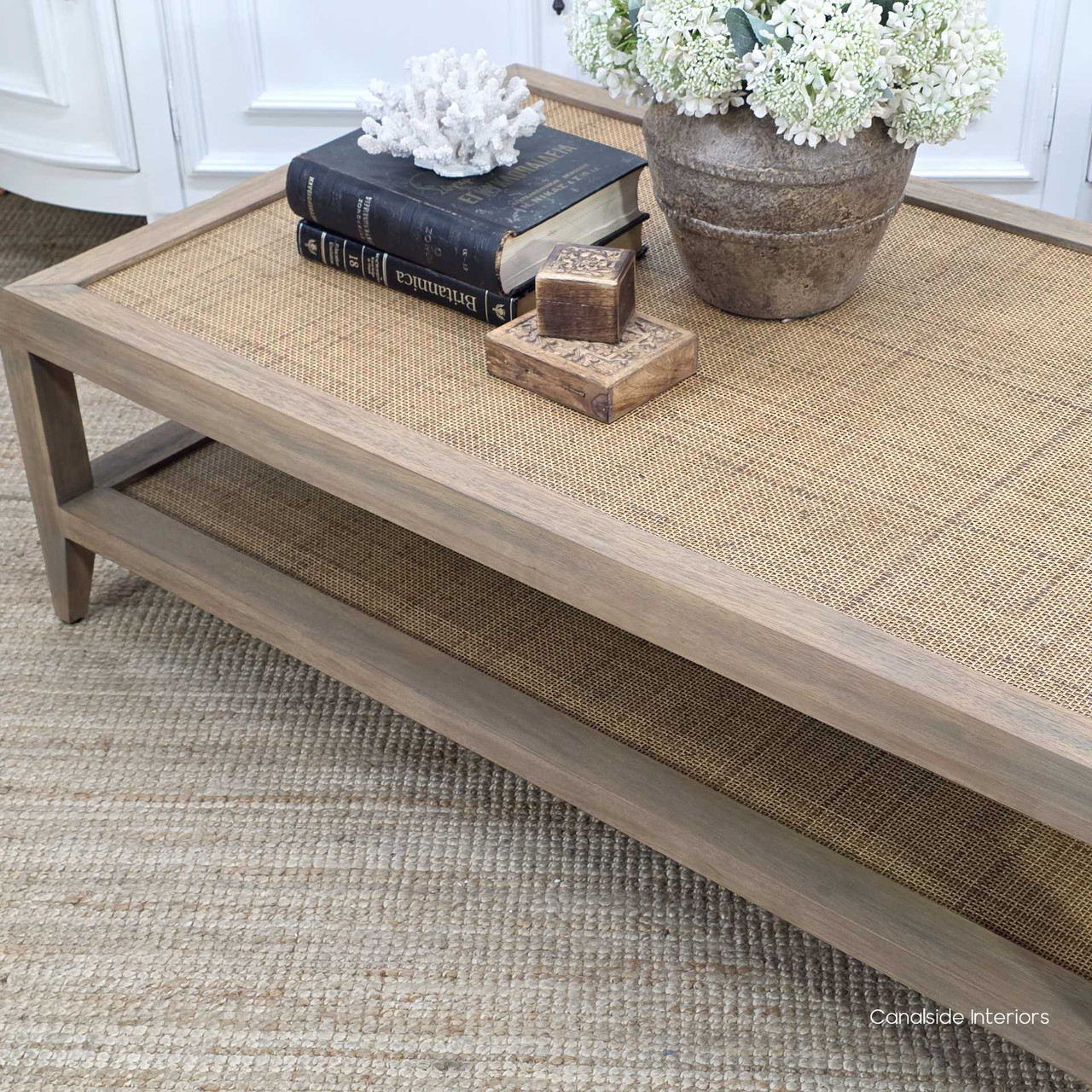 Top-down view of the Haddon Rattan Coffee Table showcasing woven rattan surface and timber border frame