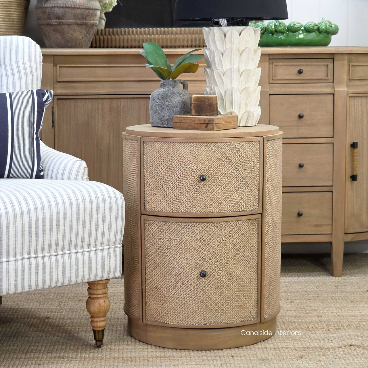 Front view of the Langston Rattan Side Table displaying the smooth surface and organic textures.