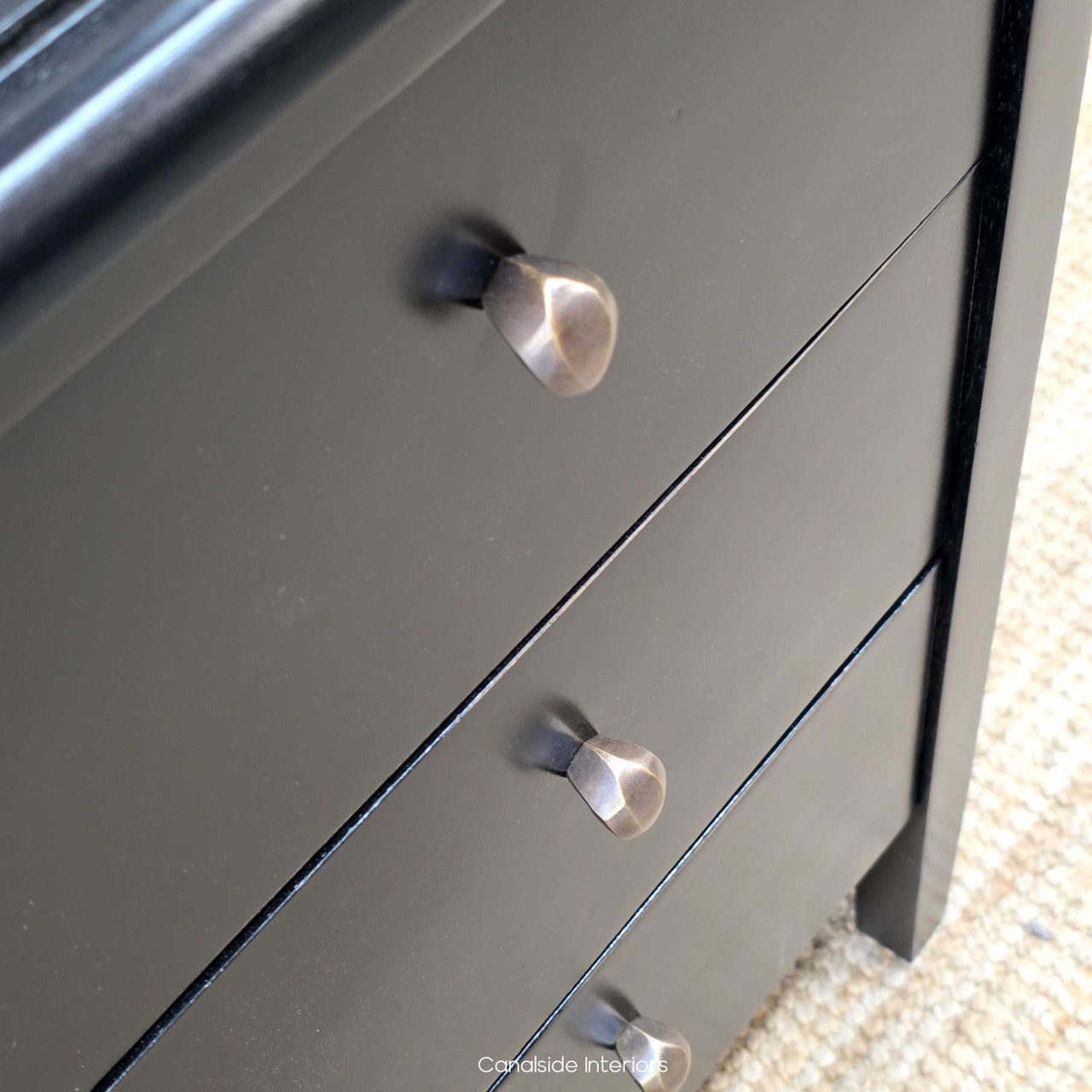 Detail shot of the Creemore 3 Drawer Bedside in Black showing the metal drawer knob and soft satin black finish