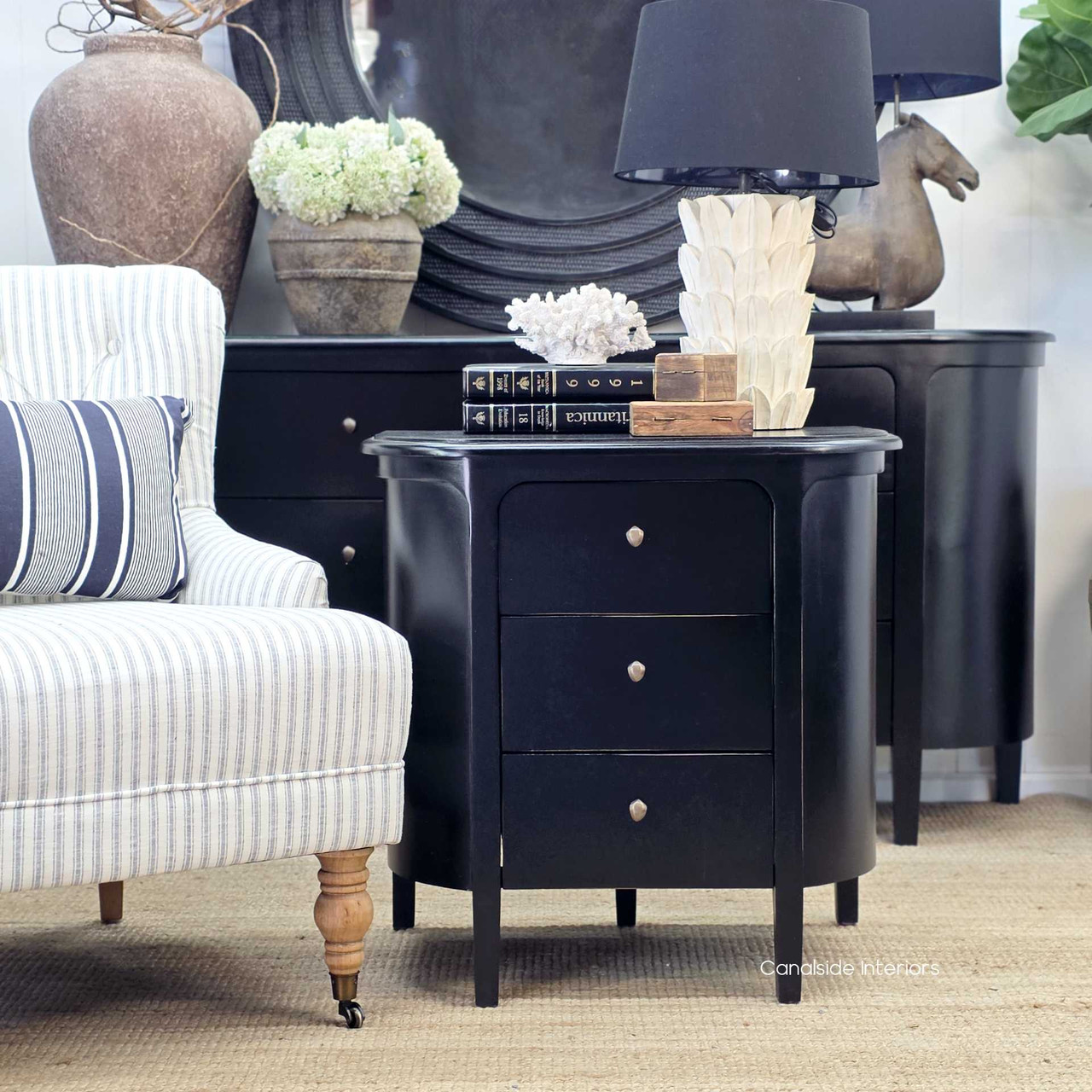 Front view of the Creemore 3 Drawer Bedside in Black demonstrating its three spacious drawers and minimalist hardware.