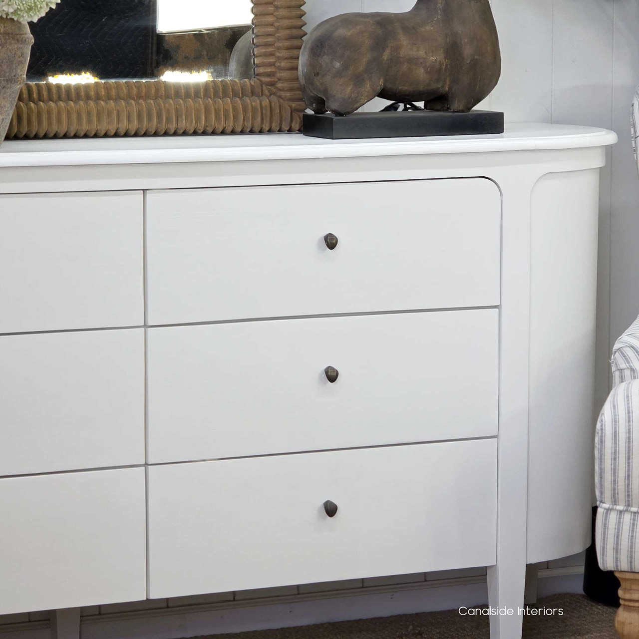 Bedroom vignette featuring the Creemore Chest in White, styled with linens and accessories to showcase its bright, clean aesthetic.
