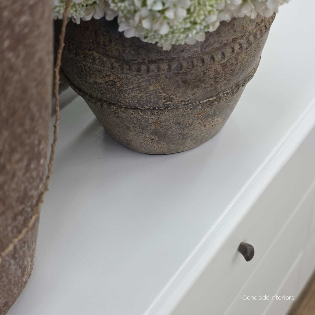 Top-down view of the Creemore 6 Drawer Chest in White showing the painted surface and rounded top profile.