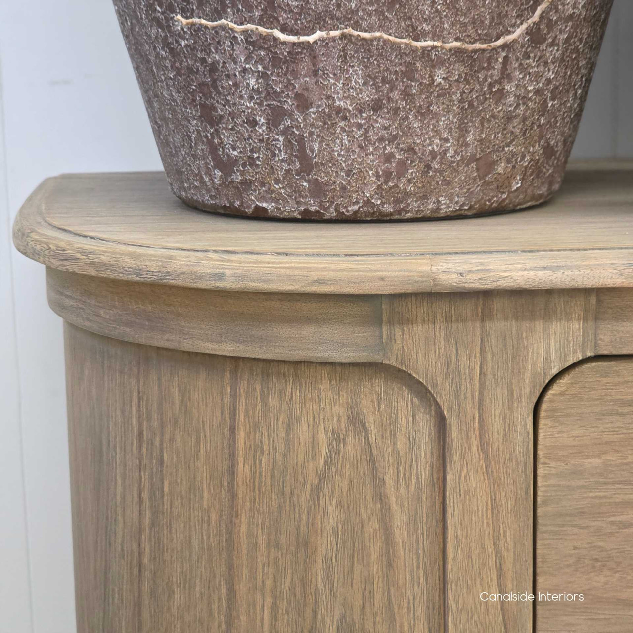 Curved corner detail of the Creemore Chest in Weathered Oak, emphasising the softened edges and sculptural craftsmanship.