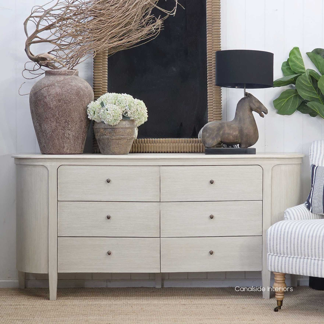 Front view of the Creemore 6 Drawer Chest in stone, highlighting the symmetrical drawer layout and refined hand-painted finish.