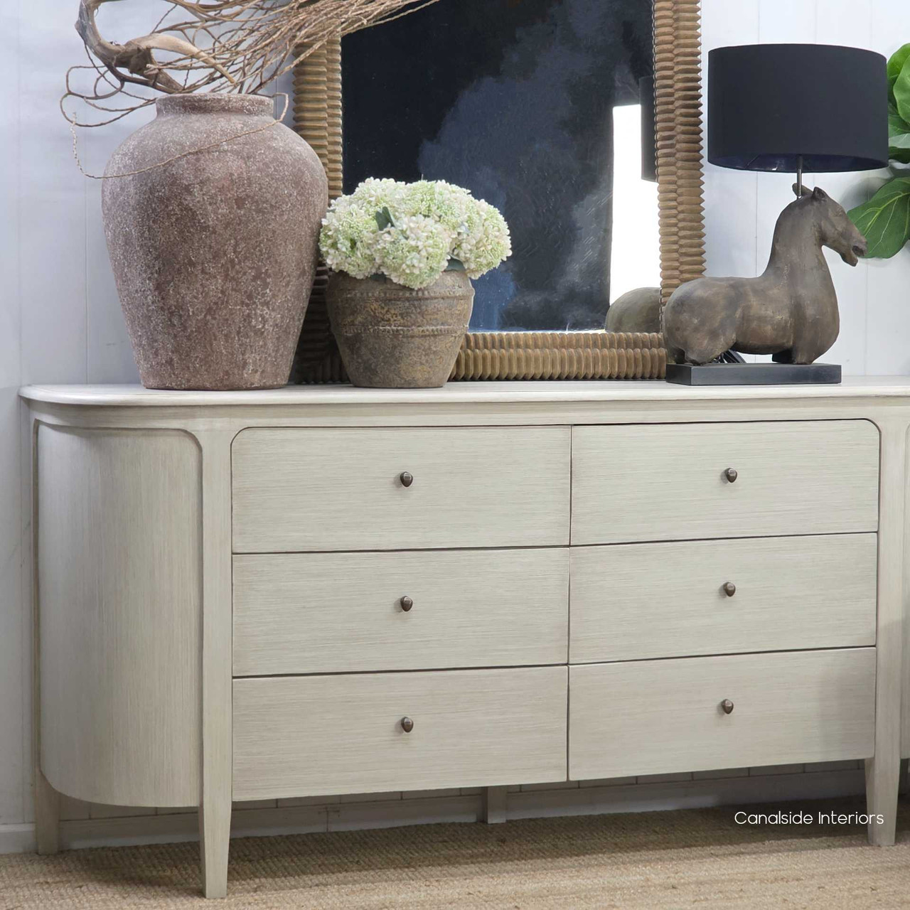 Angled view of the Creemore stone chest, revealing the smooth top surface and refined edge profile.