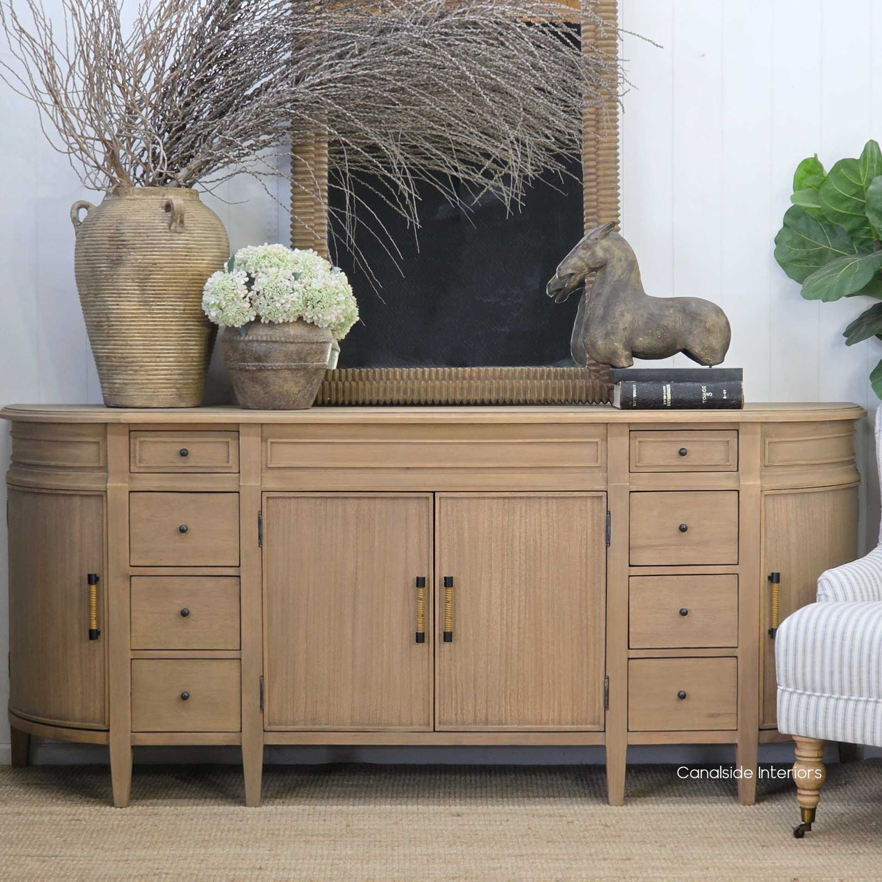 Riverview Buffet in weathered oak displaying six drawers and central cupboard storage with softly rounded edges.