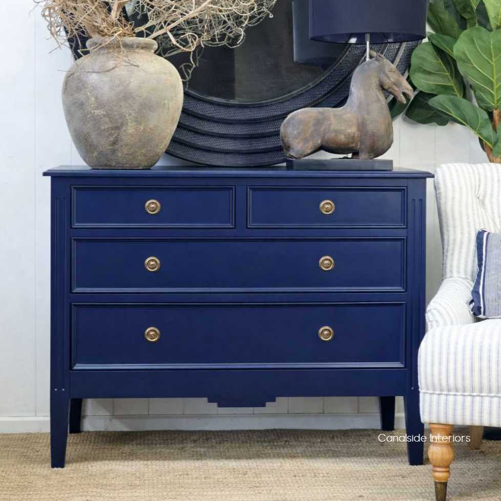 Front view of the Peninsula 4 Drawer Chest, showcasing the Navy finish, ideal for Hamptons-inspired decors.