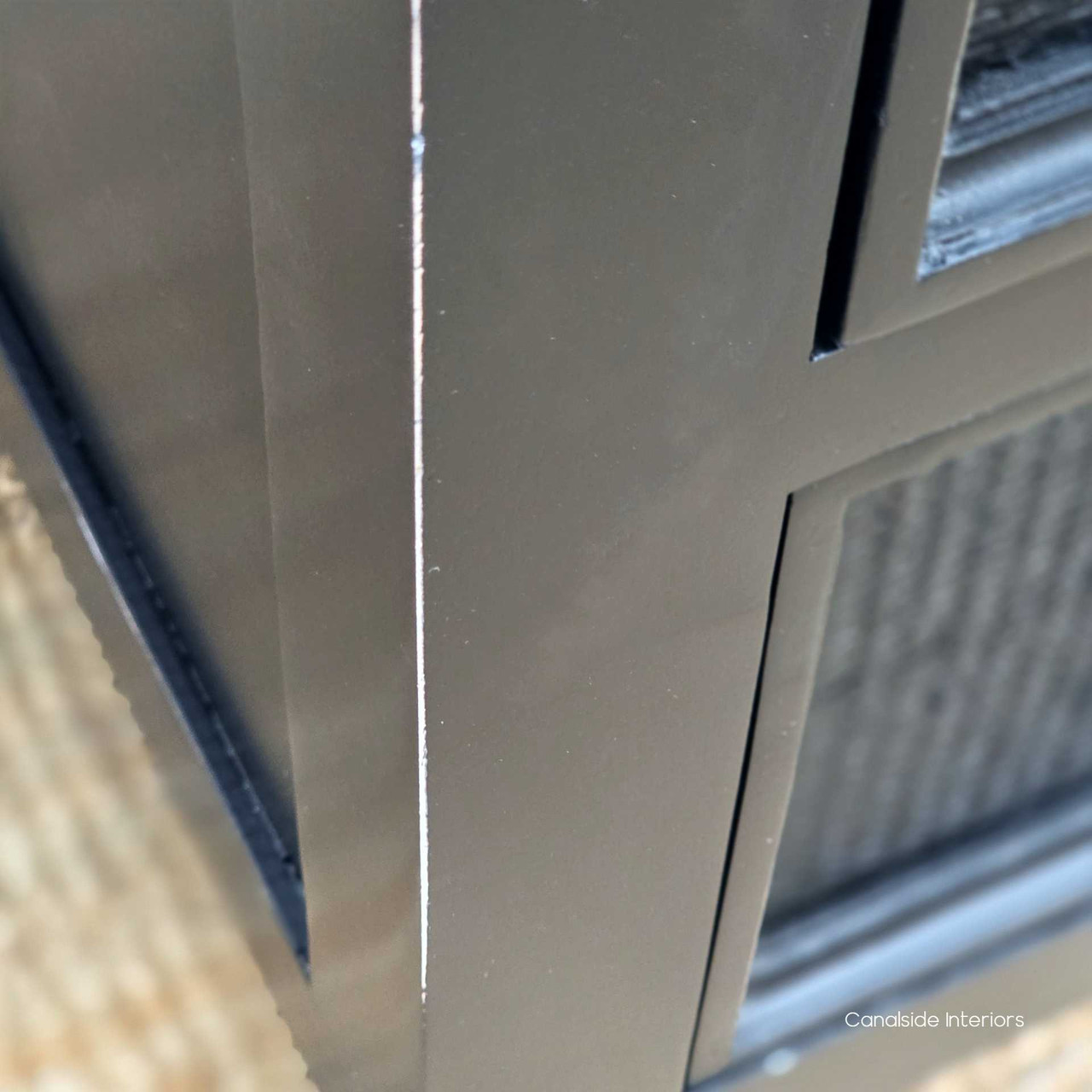 Angled corner close-up of the Brielle Rattan 6 Drawer Chest – Black highlighting crisp joinery, leg shape and painted finish.