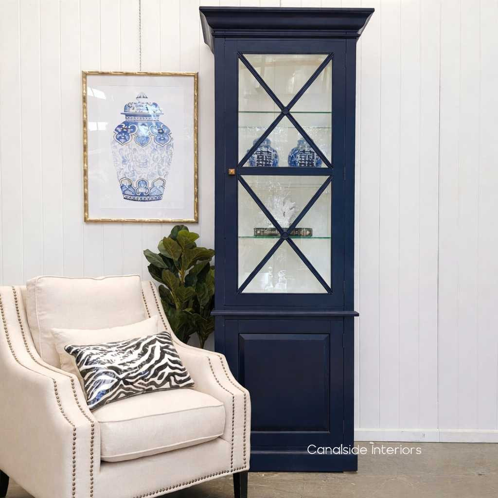 Elegant South Hamptons Display Unit in navy blue with a white interior adds a modern, yet coastal feel to Canalside Interiors' collection