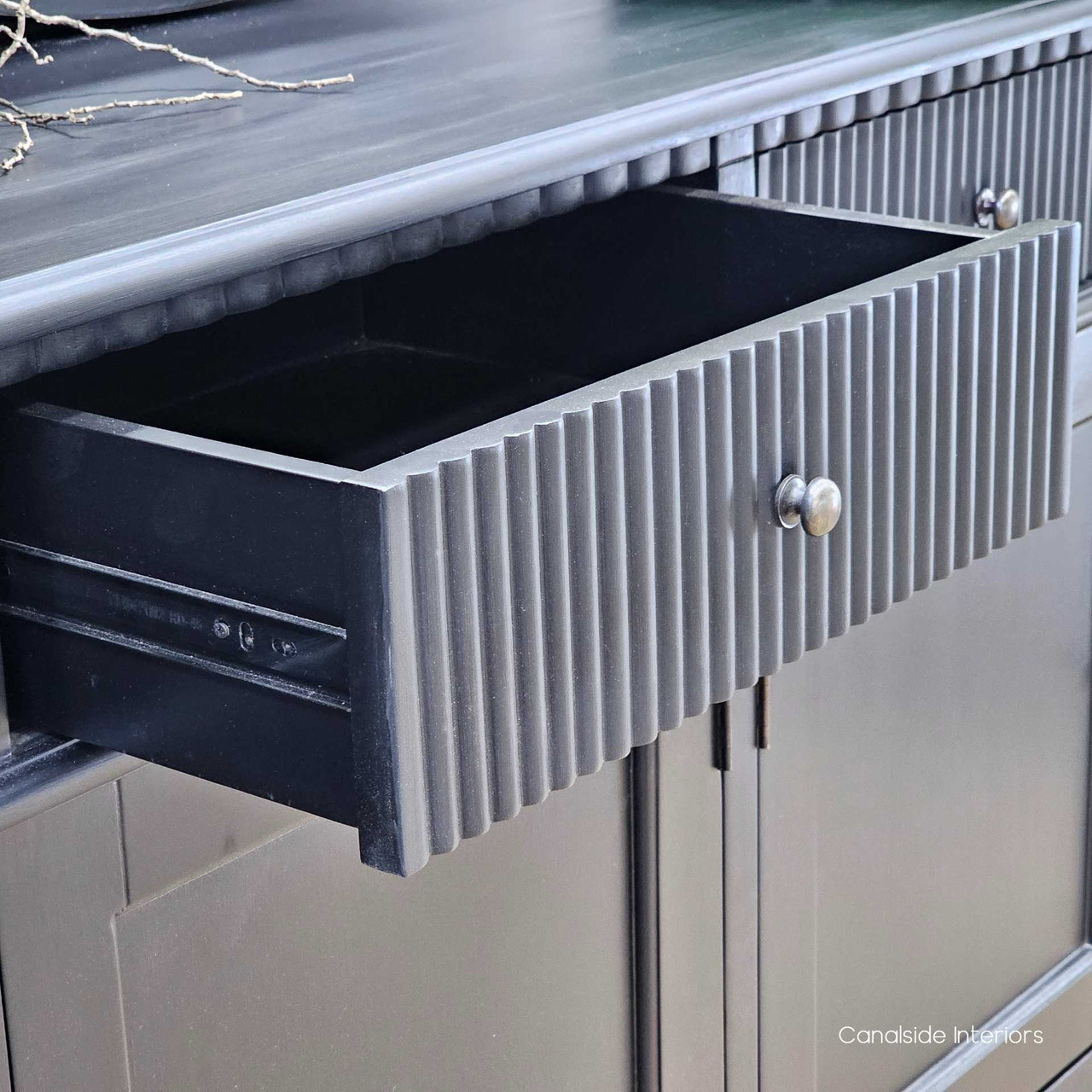 A detailed view of the French Louis Buffet Grande's metal runner drawers, emphasising ease of use and durability - Canalside Interiors.